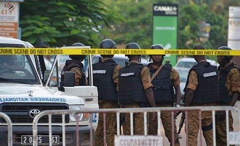 Burkinabe police patrol in Ouagadougou, following a deadly attack by gunmen resulting in 18 deaths (AFP)