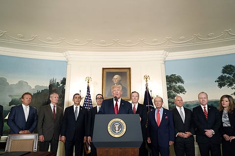 President Donald Trump speaks in the Diplomatic Reception Room of the White House in Washington, Monday, Aug. 14, 2017, during an event to sign a memorandum calling for a trade investigation of China. | AP