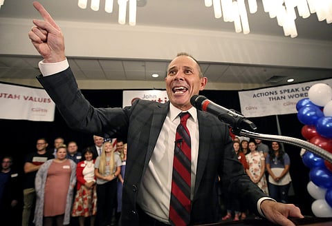 Provo Mayor John Curtis celebrates after winning Utah's Republican primary to become the favorite to fill the U.S. House seat vacated by Jason Chaffetz (AP)