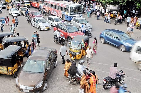 Commuters finding difficult to cross the road due to the ongoing metro rail works at Amerpeet in Hyderabad on Tuesday  | sayantan ghosh
