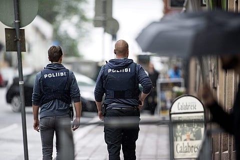Armed police officers secure the area after several people were stabbed on the Market Square in Turku, Finland, Friday Aug. 18, 2017 | AP