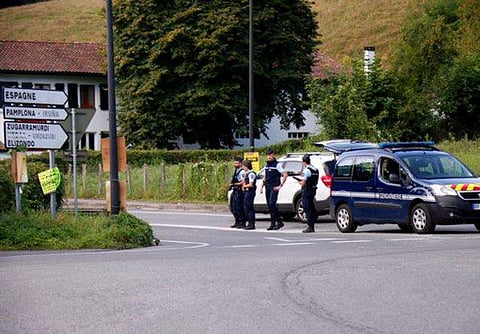 French police officers check vehicles at the border crossing between Spain and France in Dantcharia, southwestern France, on Aug.19, 2017. (Photo | AP)