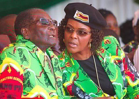Zimbabwean President Robert Mugabe, left, and his wife Grace. (File photo | AP)