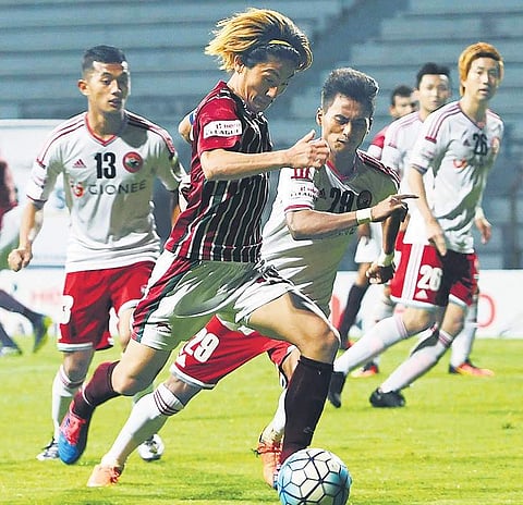 Katsumi Yusa (centre) was one among Mohun Bagan’s foreign imports last year