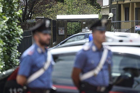Italian paramilitary police officers stand by the house of Bruno Gulotta. | AP
