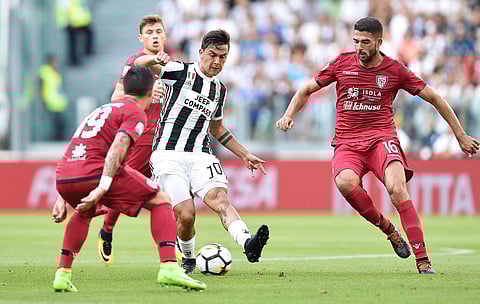 Juventus' Paulo Dybala goes for the ball during a Serie A soccer match between Juventus and Cagliari, in Turin, Italy, Saturday, Aug. 19, 2017. (Photo | AP)