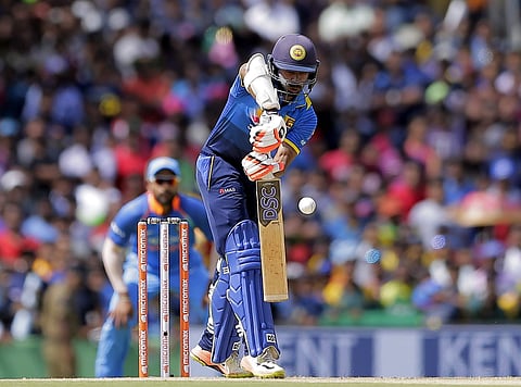 Sri Lanka's Niroshan Dickwella plays a shot during their first one-day international cricket match against India in Dambulla, Sri Lanka, Sunday, Aug. 20, 2017. (Photo | AP)