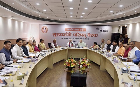 Prime Minister Narendra Modi BJP President Amit Shah and Union ministers Rajnath Singh and Sushma Swaraj and other leaders at the party's Mukhyamatri Parishad Baithak meeting of chief ministers of BJP-ruled states in New Delhi on Monday. | PTI