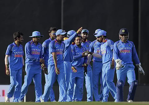 Indian players celebrate the dismissal of Sri Lanka's Wanindu Hasaranga during their first one-day international cricket match in Dambulla. (Photo | AP)