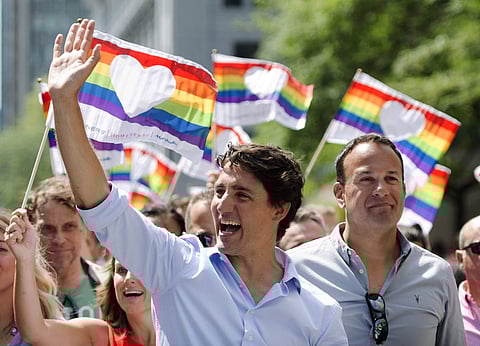 Canada Prime Minister Justin Trudeau, (L), and Irish Taoiseach Leo Varadkar participate in the annual pride parade in Montreal (AP)