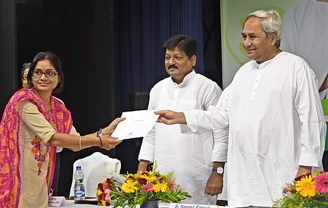 Chief Minister Naveen Patnaik handing over appointment letter to a doctor during the induction function in Bhubaneswar on Monday | Express