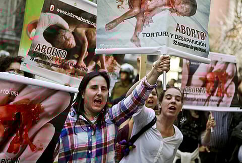 Women protest after learning Chile's Constitutional Court will uphold a measure that would end the country's absolute ban on abortions, in Santiago on August 21, 2017. The court's vote accepts the constitutionality of a measure to legalize abortions when 