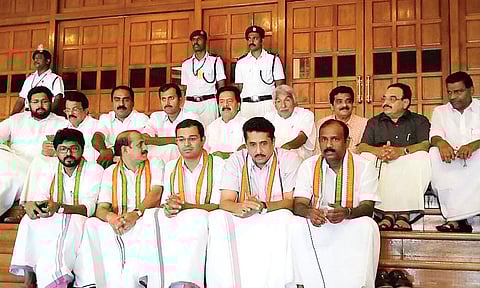 UDF MLAs and senior Congress leaders staging a sit-in protest at the entrance of  the Assembly Hall | Express