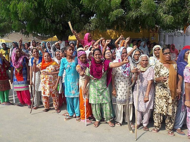 Followers of Gurmeet Ram Rahim Singh, the controversial head of religious sect Dera Sacha Sauda (DSS), gather on the roadside in Sirsa, where his organization is based, on August 24, 2017, ahead of the verdict in the rape case against Gurmeet Ram Rahim. (Express Photo | Harpreet Bajwa)
