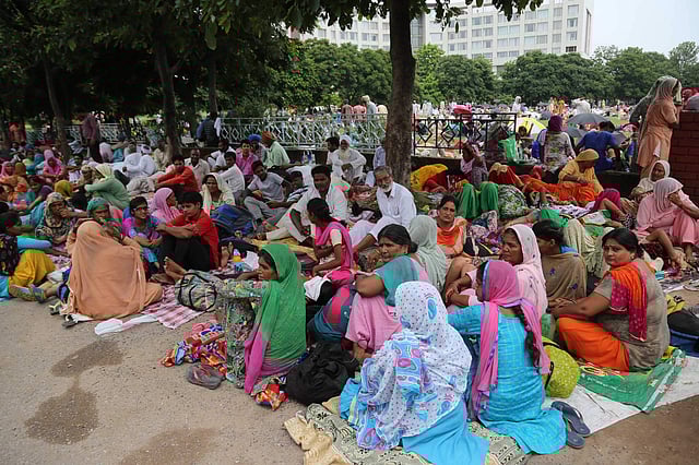 Followers of Gurmeet Ram Rahim Singh, the controversial head of religious sect Dera Sacha Sauda (DSS), gather on the roadside in Sirsa, where his organization is based, on August 24, 2017, ahead of the verdict in the rape case against Gurmeet Ram Rahim. (Express Photo | Harpreet Bajwa)