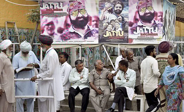 Followers of Gurmeet Ram Rahim Singh, the controversial head of religious sect Dera Sacha Sauda (DSS), gather on the roadside in Sirsa, where his organization is based, on August 24, 2017, ahead of the verdict in the rape case against Gurmeet Ram Rahim. (Photo | AP)