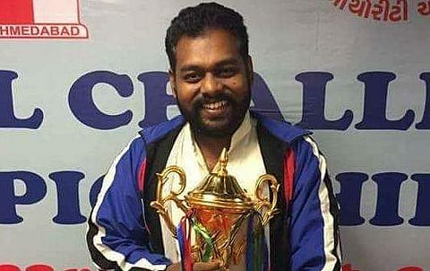 Deepan Chakkravarthy with the National Challengers Chess Championship trophy. (Twitter | Deepan Chakkravarthy)