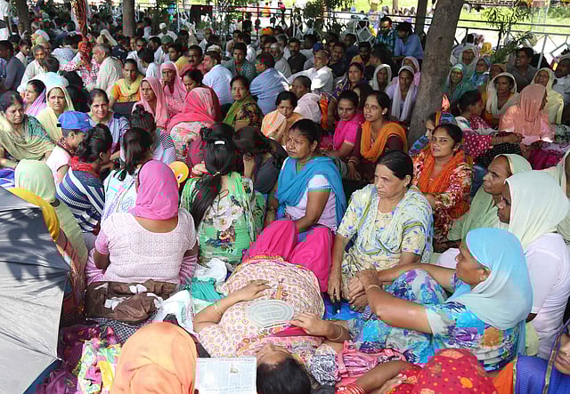 Followers of Gurmeet Ram Rahim Singh, the controversial head of religious sect Dera Sacha Sauda (DSS), gather on the roadside in Sirsa, where his organization is based, on August 24, 2017, ahead of the verdict in the rape case against Gurmeet Ram Rahim. (Photo | PTI)