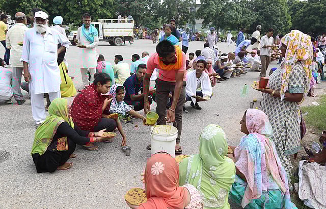 Followers of Gurmeet Ram Rahim Singh, the controversial head of religious sect Dera Sacha Sauda (DSS), gather on the roadside in Sirsa, where his organization is based, on August 24, 2017, ahead of the verdict in the rape case against Gurmeet Ram Rahim. (Photo | PTI)