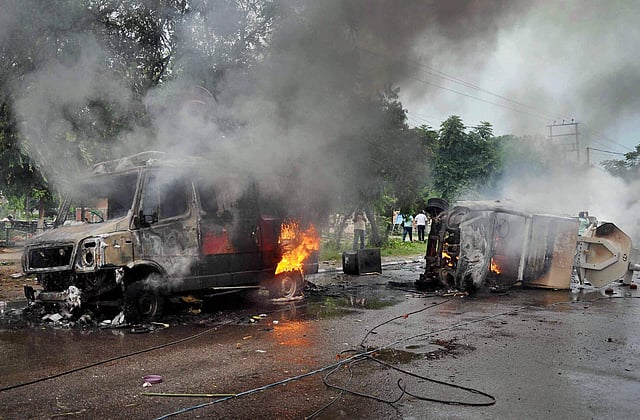 Vehicles burn in the violence unleashed by Dera Sacha Sauda chief Gurmeet Ram Rahim's followers after he was convicted in a rape case in Panchkula on Friday. (Photo | PTI)