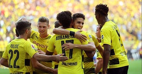 Borussia players celebrate their opening goal against Hertha Berlin (Twitter/Marc Bartra)