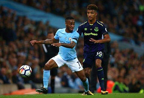 Manchester City's Raheem Sterling, left, and Everton's Mason Holgate battle for the ball during the English Premier League soccer match between Manchester City and Everton at the Etihad Stadium in Manchester, England | AP