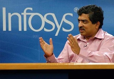 Nandan Nilekani speaks to the media in Bangalore. (Photo | Reuters)