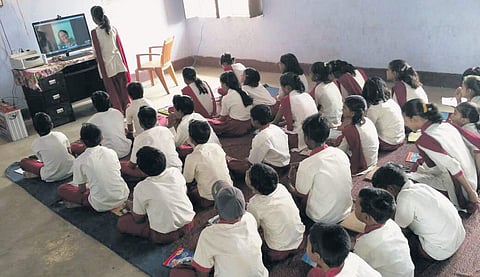 Children learn lessons in their local language digitally thanks to E-vidyaloka’s volunteers