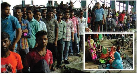 Workers at IFFCO railway siding after the unrest and (inset) wives of Paradip Erasama Industrial Workers’ Union members stage demonstration on Sunday | Express