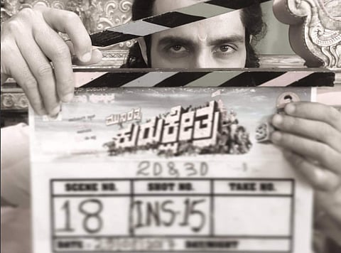 Sonu is seen holding a clapperboard in his hands in a black and white photo, which he tweeted on Tuesday.