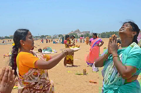 The unique South Indian festival Aadi Perukku  is a water-ritual honouring nature. The month Aadi marks the onset of monsoon.  Devotees offer their prayers  in Tiruchy. (EPS | MK Ashok Kumar)