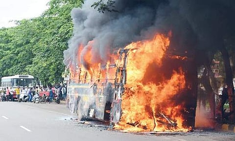 An APSRTC bus caught fire due to a technical snag near Siddhartha Medical College bus stop in V’wada on Tuesday |Express