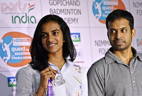 PV Sindhu with coach Pullela Gopichand. (Vinay Madapu | EPS)