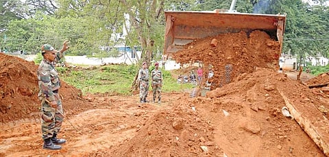Army personnel clear the land near the mosque which had led to the dispute  in JC Nagar on Wednesday | Pushkar V