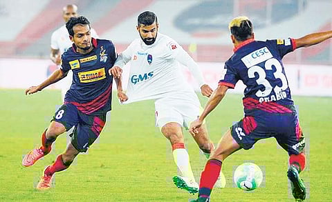 Kean Lewis (centre) had a fruitful season with Delhi Dynamos last term