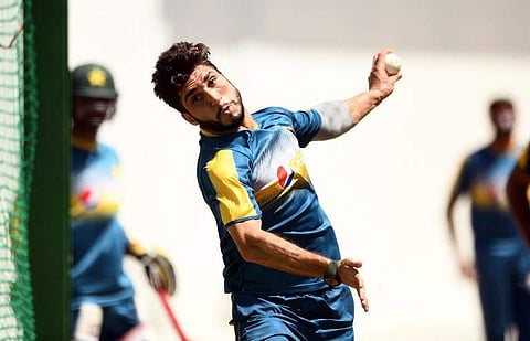 Rumman Raees delivers a ball during a practice session . | AFP