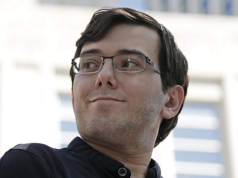 Martin Shkreli talks with reporters after leaving federal court in New York. (File photo | AP)