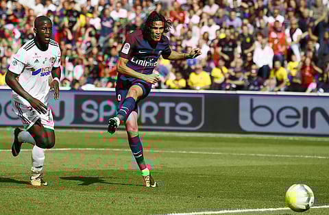 PSG's Edinson Cavani, right, scores a goal during the French major soccer league opening match between Paris Saint-Germain and Amiens at the Parc des Princes stadium in Paris Saturday, Aug. 5, 2017. (Photo| AP)