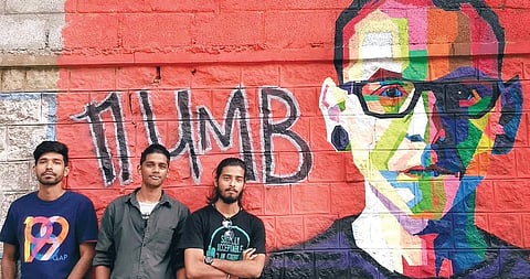 Artists Arjun Raj, Sreekumar and Vishnu Ambat with their graffiti ‘Numb’ —  a tribute to Chester Bennington of Linkin Park band — at Jyoti Nivas College, Koramangala, Bengaluru
