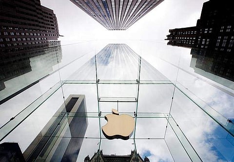 The Apple logo hangs in a glass enclosure above the 5th Ave Apple Store in New York. (File | Reuters)