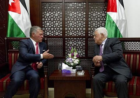 Palestinian President Mahmoud Abbas, (R), meets with Jordan's King Abdullah II at his office in the West Bank city of Ramallah (AP)