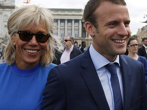Emmanuel Macron and his wife Brigitte Trogneux. (Photo | AP)