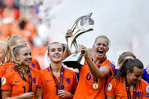Players of the Netherlands celebrate with the trophy after defeating Denmark at the Women's Euro 2017 final soccer match in Enschede. | AP