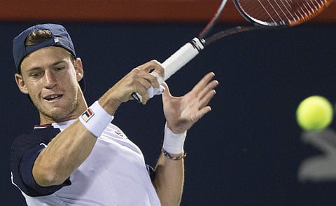 Diego Schwartzman of Argentina returns to Dominic Thiem of Austria during the first round of the Rogers Cup tennis tournament. | AP