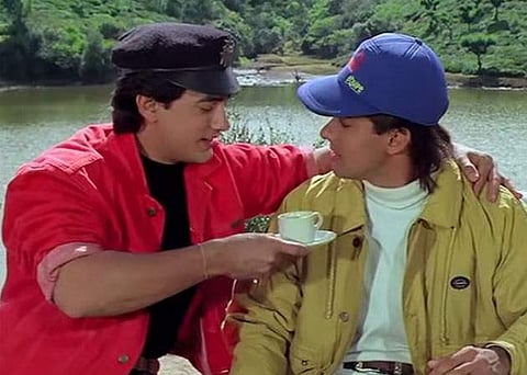 Actor Viju Khote, who played Robert in 'Andaz Apna Apna', feels somebody needs to coax its director Rajkumar Santoshi to make the 1994 comedy film's sequel. Image: Aamir Khan and Salman Khan in 'Andaz Apna Apna'.