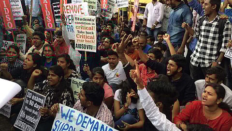 VTU students Protest at Mysuru bank circle in Bengaluru on Friday. (Photo | Nagaraja Gadekal)