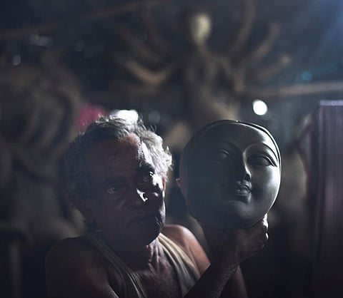Here are some moments from the past week captured by our photographers from across the country. An artist from Bengal making clay Durga Idols for the upcoming Durga Puja in Hyderabad | (Express Photo | Vinay Madapu