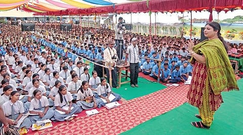 Shanti Desai teaching a class of about 7,000 students at Chamakeri village in Belagavi district