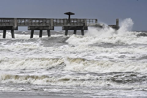 Waves crash on the Jacksonville Beach Fishing Pier in Jacksonville Beach as Hurricane Irma batters Florida. (File photo | AP)