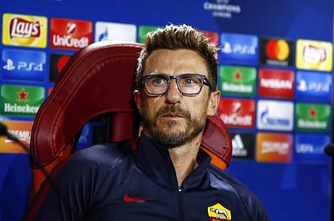 Roma coach Eusebio Di Francesco meets the media during a press conference ahead of Tuesday's Champions League group stage soccer match against Atletico Madrid. | AP